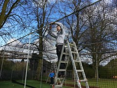 Views of Club members getting down to the business of having the ground ready for the new season.