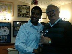 Adil Parker collecting his fielder of the year award from Chairman Colin Horsley