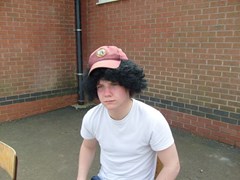Whitey in need of a bigger hat to cover his awesome barnet!