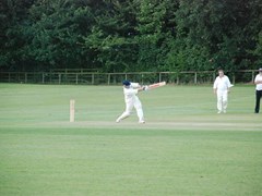 Foxy smashes one to the mid-on boundary