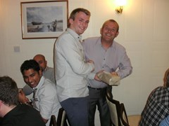Joe presents the 'Best Groundsman' award to Donny Reid