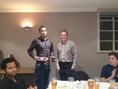 Club President, Andy Lowden, presents the player of the year award to Aman Arora