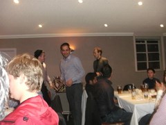 Andy Dolman presents the 3rd XI bowling award to Ashish Juneja