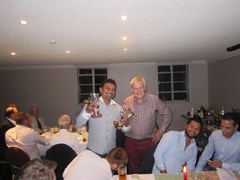 Alan Adie presents the 2nd XI batting and bowling awards to Chamila Perera